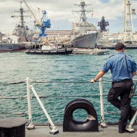 PO1 Shawn Steunenberg takes a final glance at Pearl Harbor as HMCS Vancouver sets sail towards Guam for WestPloy on Aug. 18. Photo by LS Sergej Krivenko, HMCS Vancouver