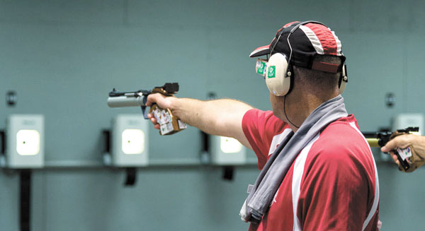 Captain Hynes aims to shoot at the 2016 Canadian National Pistol Championships at the Pan Am facility, located at the Toronto International Trap and Skeet Club, in Cooksville, Ontario.