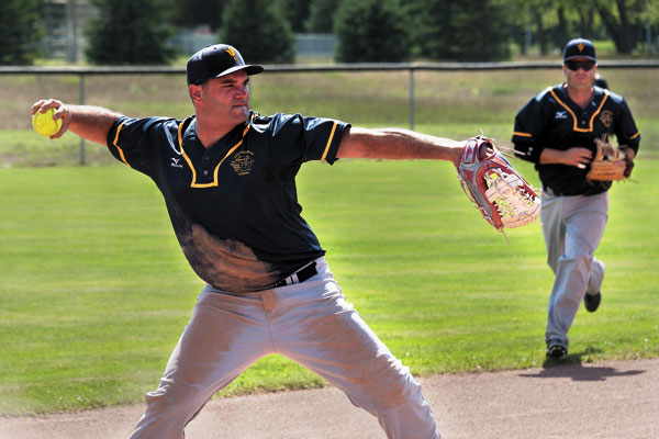 Tritons men’s player LS Alex Blackburn winds up a throw during the Canadian Armed Forces Mens Slow Pitch Nationals round robin at CFB Borden. Photo by OS Callum Rutherford, Base Borden Imagery