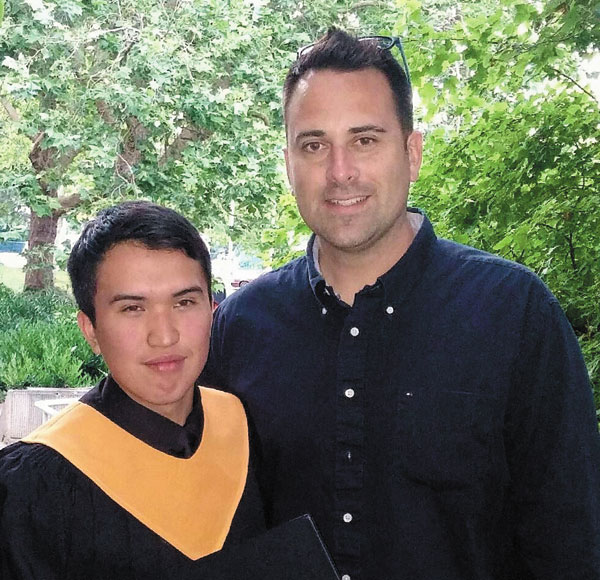 Kyle Webster with Big Brother Joshua Buck at his high school graduation.