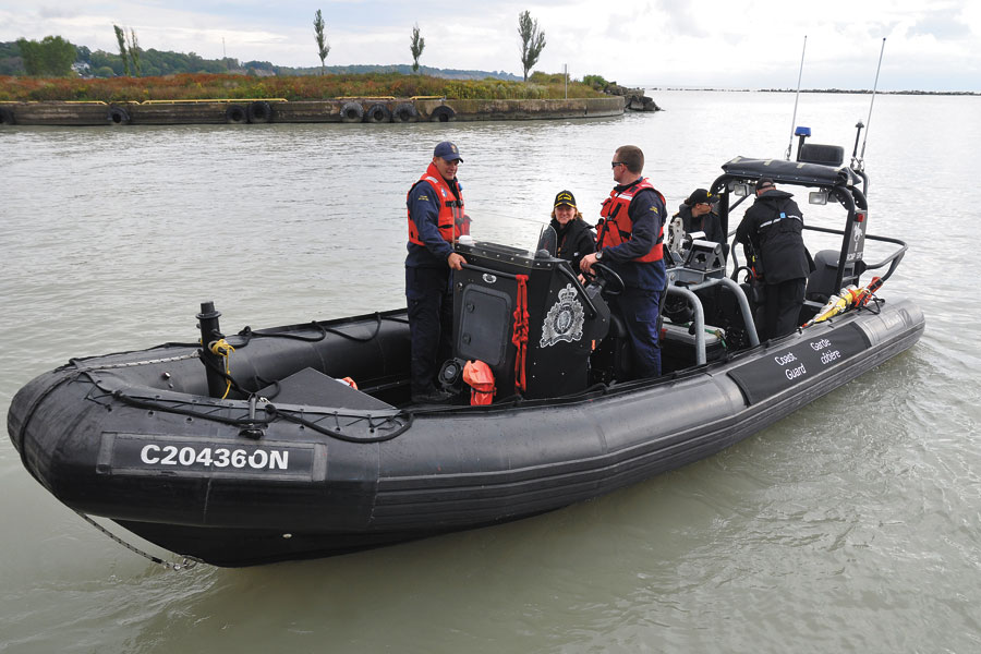 Commodore Marta Mulkins, Commander Naval Reserve (centre), on a joint Canadian Coast Guard / RCMP rigid hulled inflatable boat during Exercise Erie Valour. Photo by Lt(N) David Lewis