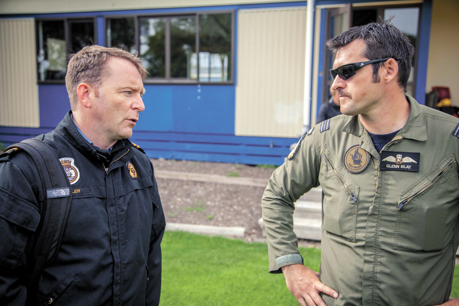 Commander Clive Butler, Commanding Officer of HMCS Vancouver, speaks with Flight-Lieutenant Glen Blay in Kaikoura, New Zealand on Nov. 17 before a meeting with other nations to determine how to assist New Zealanders and Kaikoura following the Nov. 14 massive earthquake. Photo by LS Sergej Krivenka, HMCS Vancouver