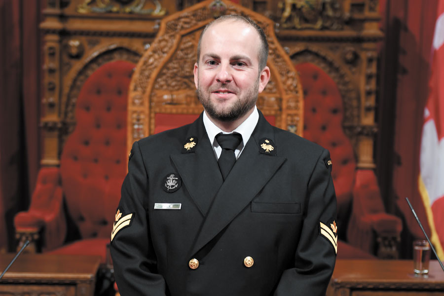 Master Seaman Brett Poulin enjoys a moment in Parliament.
