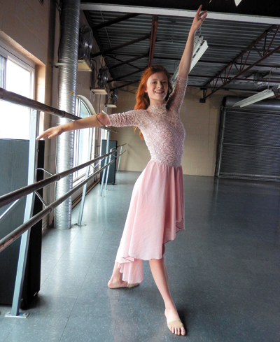 Julianna in dance mode, with her artificial arm.