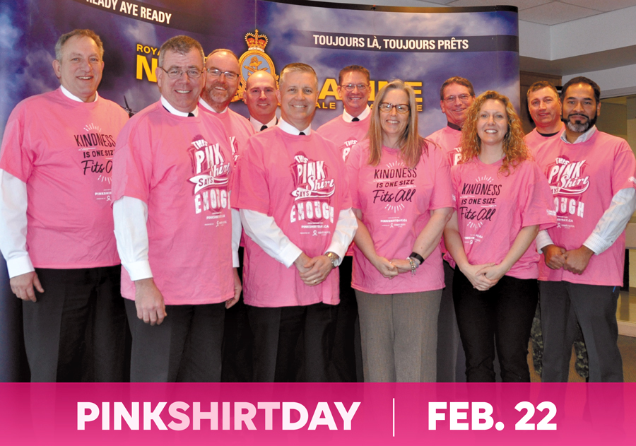 Maritime Forces Pacific leadership and DND civilian employees in D100 show their support for anti-bullying by donning the symbolic pink shirt.