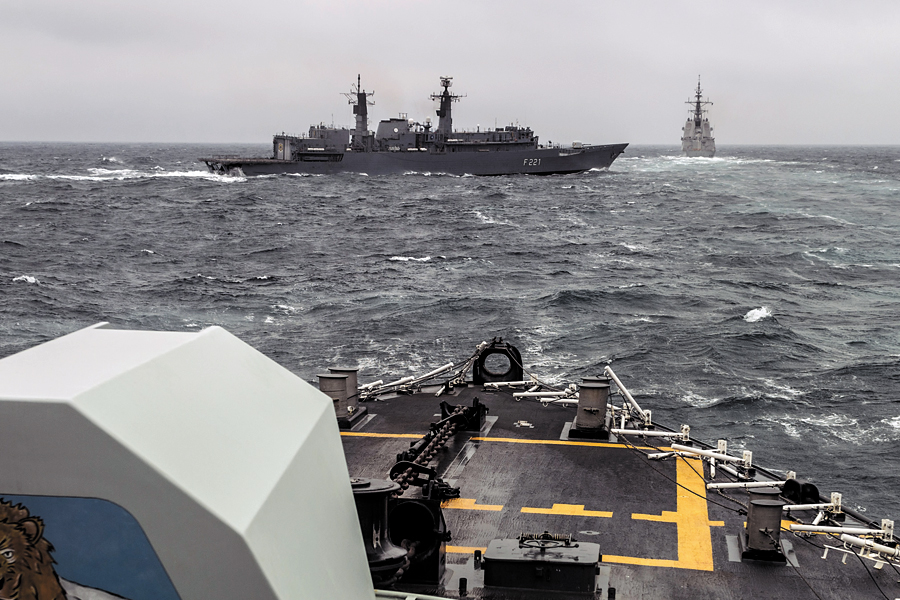 Romanian Naval Ship Ferdinand sails in-between HMCS St. John’s and the Spanish frigate Juan de Borbon in preparation for replenishment at sea approaches during their transit on the Black Sea Feb. 8, during Operation Reassurance. Photo by LS Ogle Henry, Formation Imaging Services