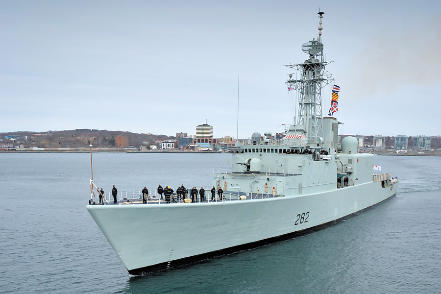 HMCS Athabaskan pulls into port at Halifax Dockyard for the last time on March 10. The last of the Iroquois-class destroyers was paid off after more than 44 years of service. Photo by MCpl C.A. Stephen, Formation Imaging Services Halifax