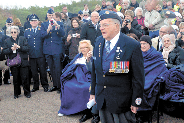 Edward Carter-Edwards sings “We’ll Meet Again” during a visit to Buchenwald concentration camp in 2014. Photo by Lieutenant-Colonel (Retired) Dean Black, Royal Canadian Air Force Association