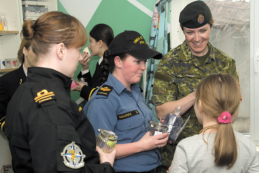 Canadian Armed Forces women put their candle-making skills to the test at the Nightingales Children’s Project in Cernavoda, Romania, during HMCS St. John’s visit to Constanta Feb. 5.