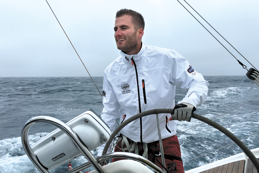 LS Spencer Baldwin is at the helm of Sea Smoke, a Bavaria 38 Cruiser, during the Route Halifax Saint Pierre Ocean Race in 2016.