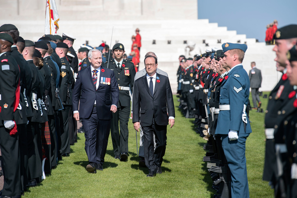 His Excellency the Right Honourable David Johnston, Governor General and Commander-in-Chief of Canada, and French President Francois Hollande review the Canadian Armed Forces guard during the signature ceremony for the 100th anniversary of the Battle of Vimy Ridge on April 9, 2017. Photo by Sgt Pierre Theriault, Base Borden Imagery.