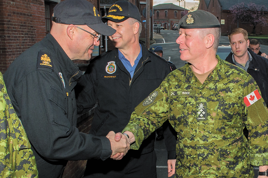 General Vance is welcomed to the base by Chief Petty Officer First Class Gilles Grégoire, MARPAC Chief Petty Officer. Photo by Cpl Blaine Sewell, Formation Imaging Esquimalt