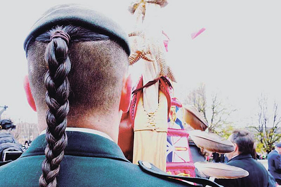 Soldier with braids - identity, tradition, pride