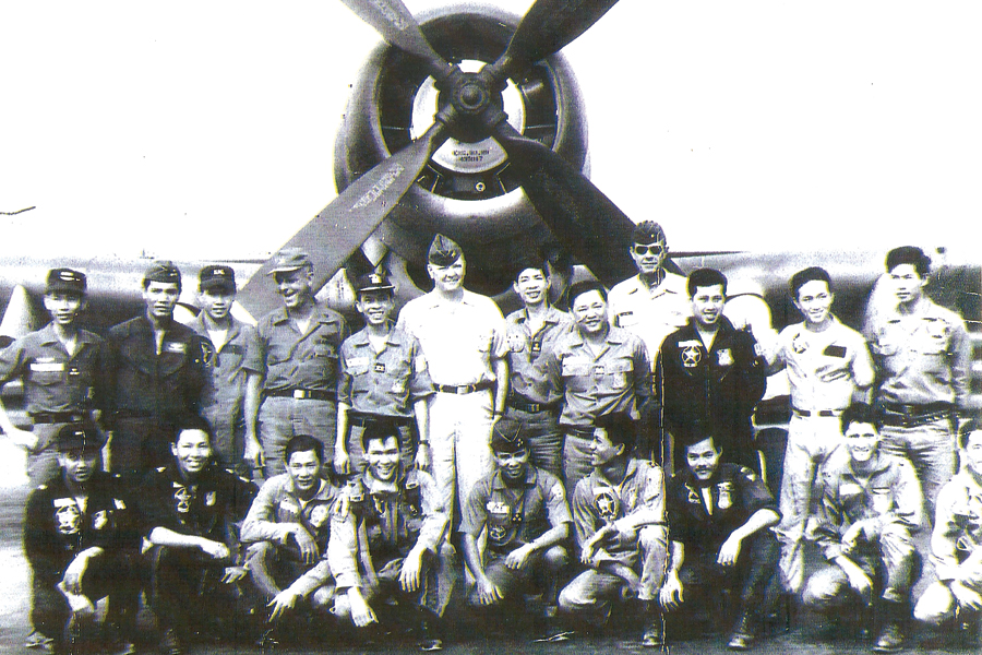 Ho Mai Linh’s “Uncle 15” (Sky Raider pilot) kneels in the front row, second from the right. 