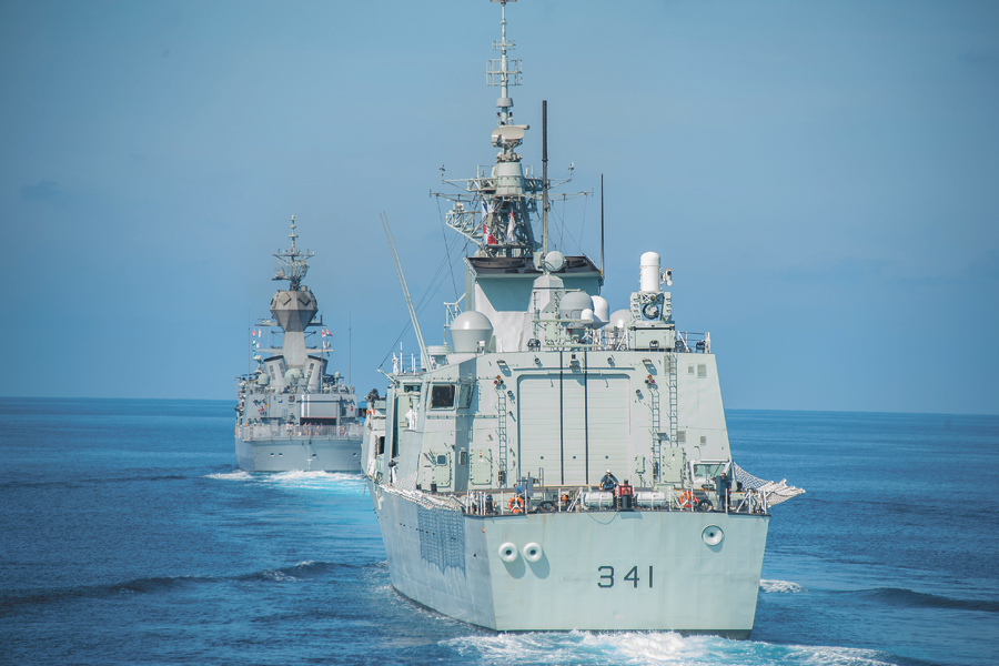HMAS Ballarat and HMCS Ottawa sail in formation with HMCS Winnipeg as part of manoeuvres. Photo by Cpl Carbe Orellana, MARPAC Imaging Services