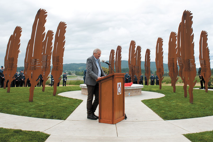 Sculptor Illarion Gallant speaks during the unveiling and dedication of the Hospital Hill Memorial Sculpture he designed called “Lost Airmen of the Empire” at the Victoria International Airport June 1. Photo by MCpl Chris Ward, MARPAC Imaging Services