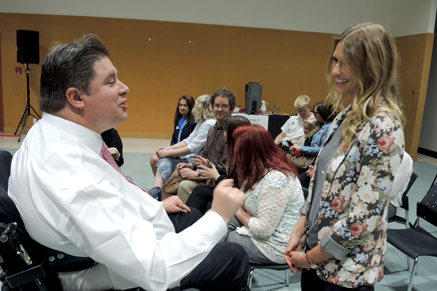 Kent Hehr, Minister of Veterans Affairs, meets with Military Family Resource Centre social worker Kaitlyn Ross during his visit to the Colwood Pacific Activity Centre May 30. Photo by Peter Mallett, Lookout