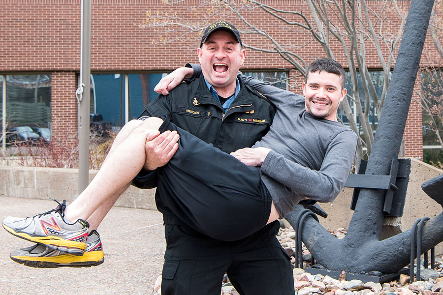 CPO1 Daniel Mercier, Fleet Chief Canadian Fleet Atlantic, lifts PO2 William Duff as part of the Give A Lift campaign. Replacing the Ice Bucket Challenge, this is the new fundraiser for ALS awareness. Photo by Mona Ghiz, Marlant Pa