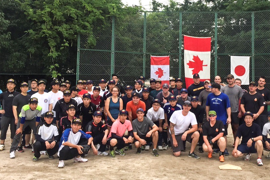 Sailors from the Japanese Maritime Self-Defense Force, HMCS Ottawa, and HMCS Winnipeg after a baseball game. Photos by Royal Canadian Navy Public Affairs