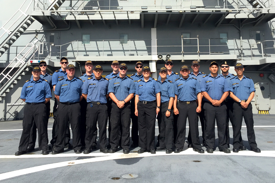 The Royal Canadian Navy sailors taking part in Replenishment at Sea training with the Chilean Navy pose for a photo on board the Almirante Montt.