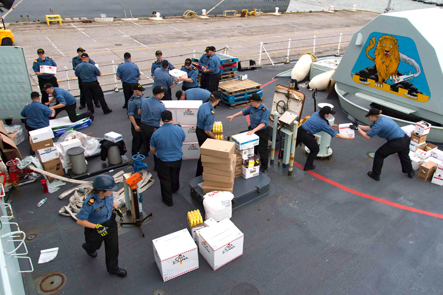 Crew members from HMCS St. John’s receive supplies at Norfolk Naval Base in West Virginia before departing on Operation Renaissance. Photo by MCpl Chris Ringius, Formation Imaging Services Halifax