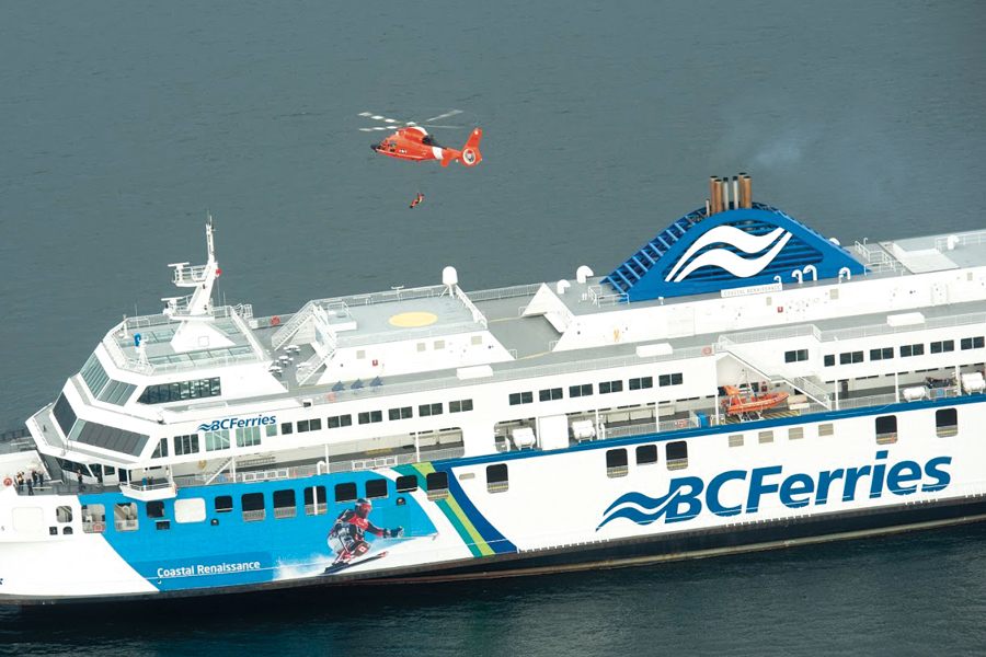 United States Coast Guard members were lowered to the deck of B.C. Ferries' Coastal Renaissance. Photo by Corporal Nathan Spence