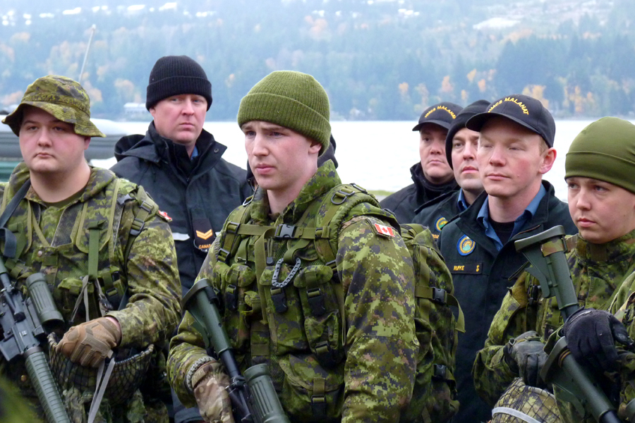 Members of The Canadian Scottish Regiment (Princess Mary’s) and Naval Reserve Division Malahat listen to a safety brief prior to an amphibious landing. Photos by Second Lieutenant Cameron Park