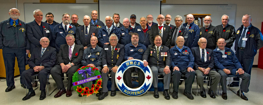 The surviving crew members of HMCS Kootenay pose for a group photo during the Commemorative Ceremony held at Damage Control Training Facility Kootenay on Oct. 23. Photo by LS Trent Galbraith, Formation Imaging Service