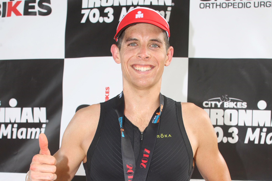 Lt(N) Nico Lightbody at the finish line of the Ironman Miami 70.3 competition. Photos by FinisherPix