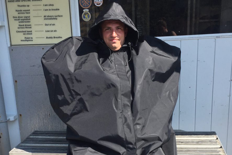 Leading Seaman Glen Straarup, Fleet Diving Unit (Pacific), tries out the Standby Diver Over Garment during a recertification course. Photo by Master Seaman Sara MacAleese