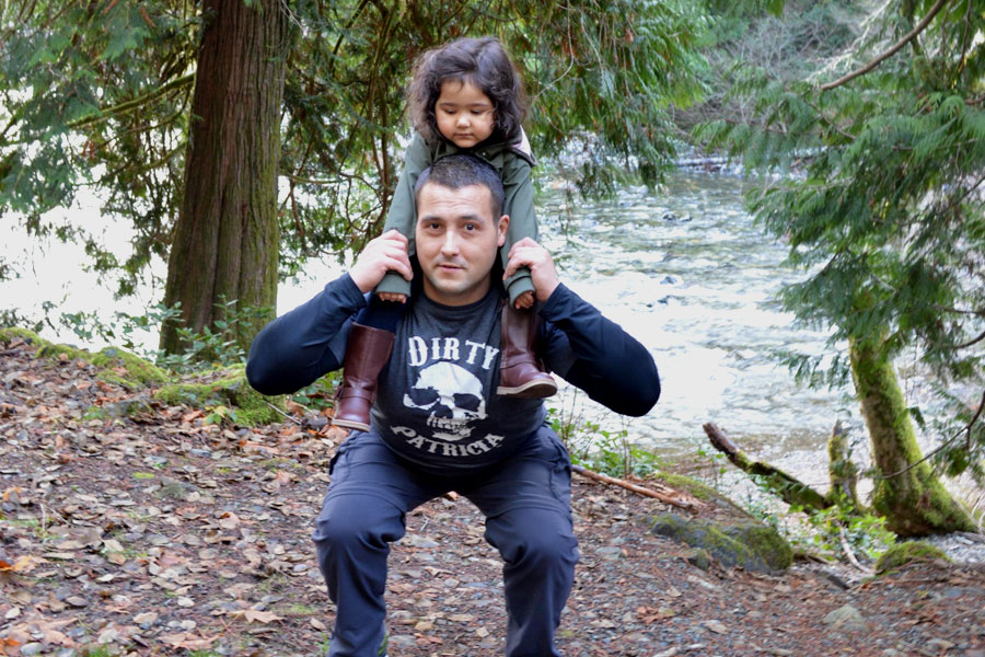 LS Kris Winther practices squats with his daughter Francesca Sabrina near his home in Sooke. On Dec. 20 LS Winther will attempt to break the world record for consecutive squats in a fundraiser for BC Children’s Hospital. Photo by Fabiola Gavidia