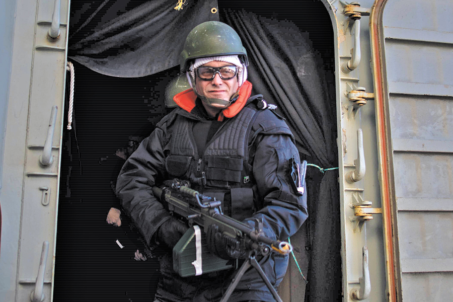 Terrebonne MP Michel Boudrias, a former Army Captain who served in Afghanistan, participates in a force protection scenario on board HMCS Toronto. Photos by: CPO2 Shawn Kent, FIS Halifax