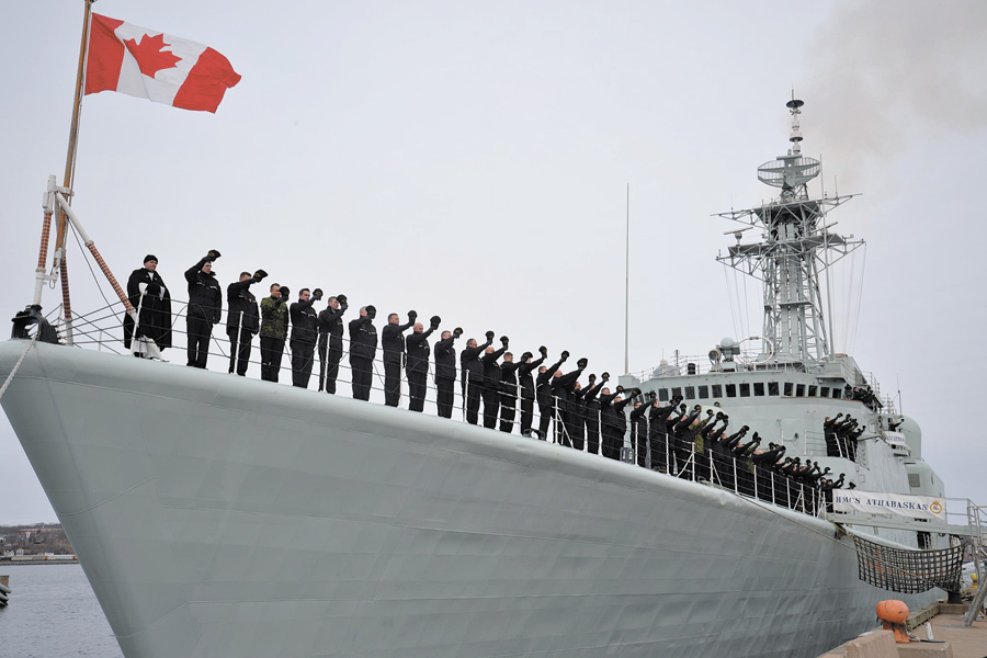 Sailors line the bow of HMCS Athabaskan during the ship’s paying off ceremony on March 10, 2017. Photo by FIS Halifax