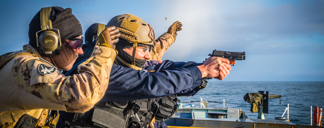 Left: Two members conduct small boat operations from HMCS Whitehorse. Right: A crew member from HMCS Edmonton fires a C8 rifle on the ship’s fo’c’sle during Operation Caribbe in the eastern Pacific Ocean. Photos by MARPAC Public Affairs