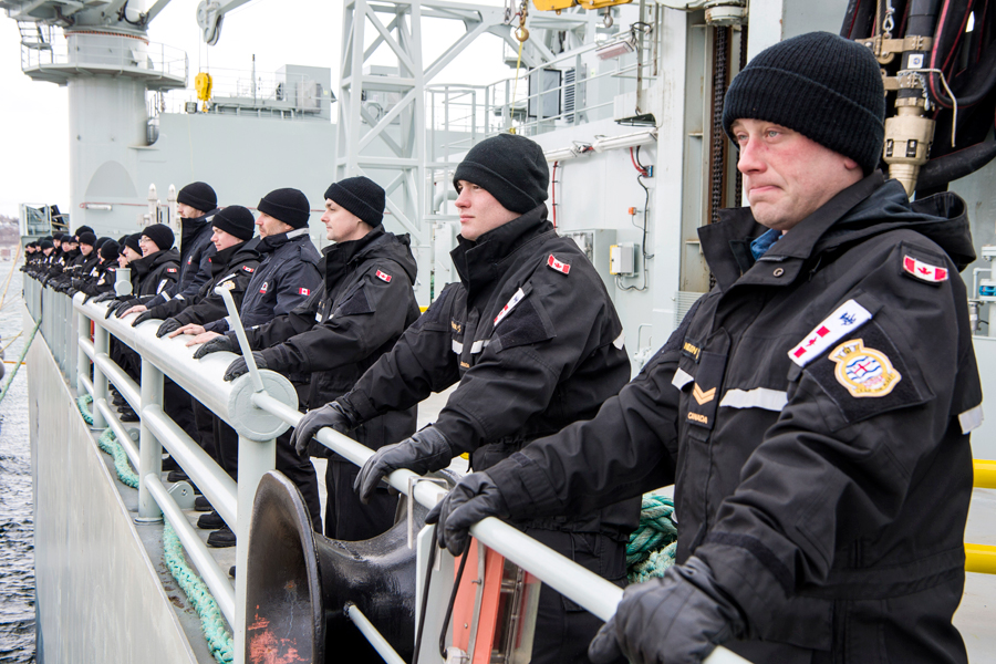 Members of NRU Asterix line the rails of the ship prior to the ceremony welcoming MV Asterix to the Atlantic Fleet March 6. Photos by Mona Ghiz, MARLANT PA