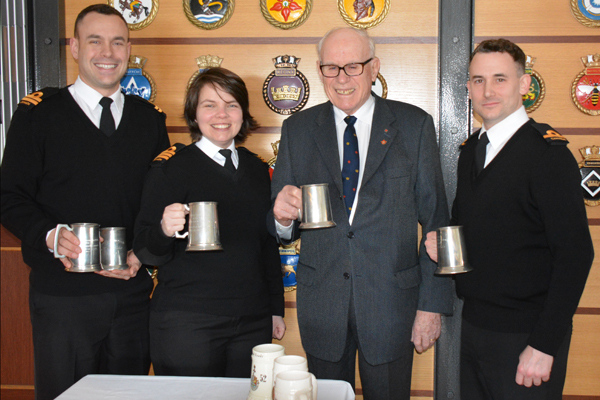 Vice-Admiral (Retired) Nigel Brodeur donates beer steins