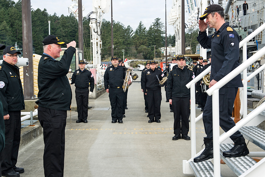 Commodore Jeff Zwick, Commander of Canadian Fleet Pacific, greets Commander Steve Lenik, Commanding Officer of HMNZS Te Kaha, on F Jetty Colwood March 6. Photo by Leading Seaman Ogle Henry, MARPAC Imaging Services