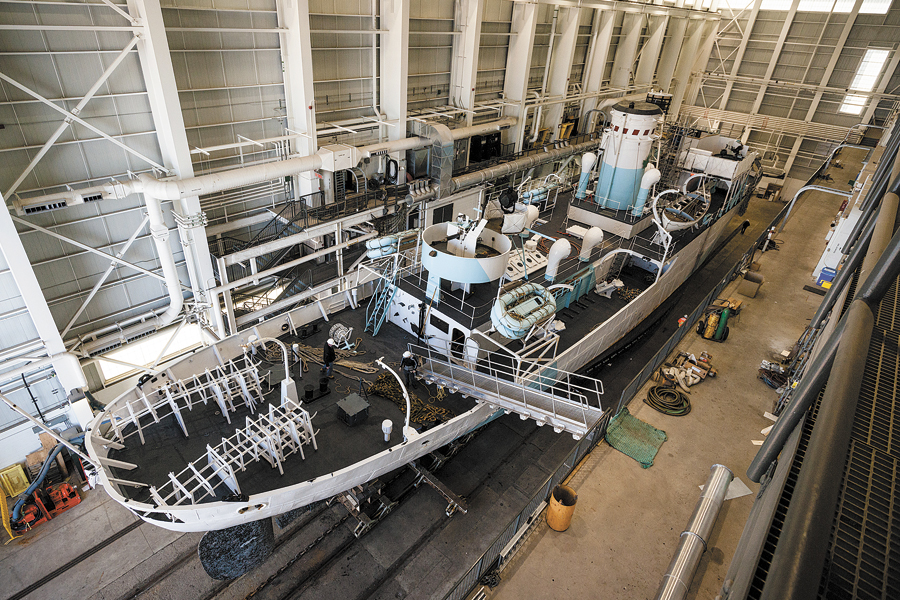 HMCS Sackville has been hoisted from the water and wheeled into the submarine shed at HMC Dockyard where it is undergoing repair work over the next three months. Photo by Sandy McClearn, CNMT Trustee