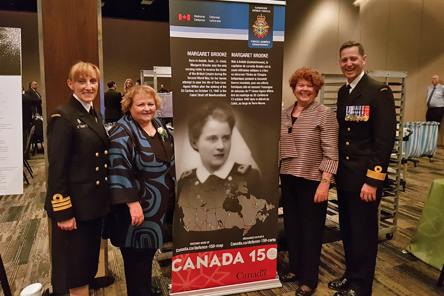 Cdr Michele Tessier, Margaret and Alyson Brooke, and Commander Canadian Fleet Atlantic Cmdre Craig Skjerpen.