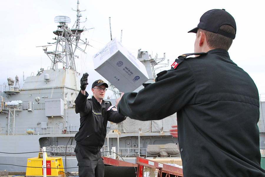 Crewmembers from HMCS Vancouver were busy last week filling the ship’s stores in preparation for their departure. Photo by SLt M.X. Dery, MARPAC PAO