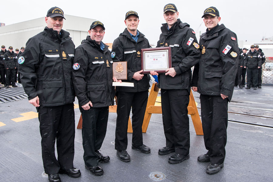From left: CPO1 Barry Eady, HMCS Charlottetown Coxswain; CPO1 Daniel Mercier, Fleet Chief; MS Stewart Riggs, the Atlantic Fleet’s new Sailor of the Year; Cmdre Craig Skjerpen, and Cdr Nathan Decicco, Commanding Officer of HMCS Charlottetown. Photo by Mona Ghiz, MARLANT PA