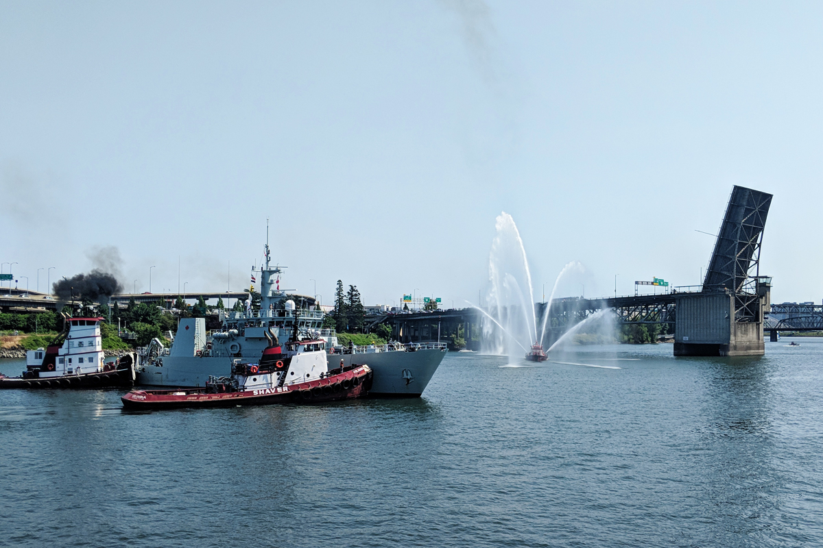 Portland Fire Department fire boat puts on a display as HMCS Regina comes alongside in Portland. Photo credit: HMCS Regina