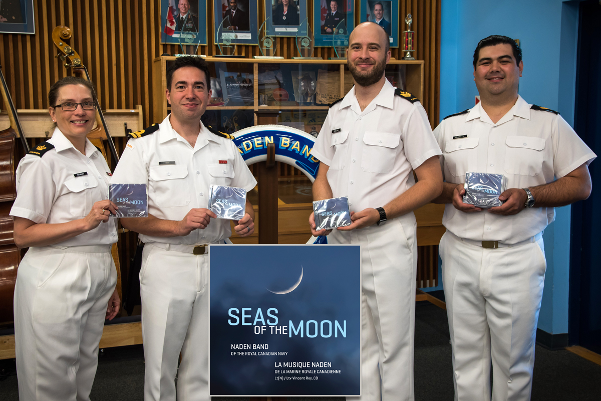 PO1 Marie-Perle Broadley (project manager), Lt(N) Vincent Roy (Commanding Officer and Director of Music), PO2 Steven Donegan and PO2 Bob Fearnley (project supervisors) with their new CD.