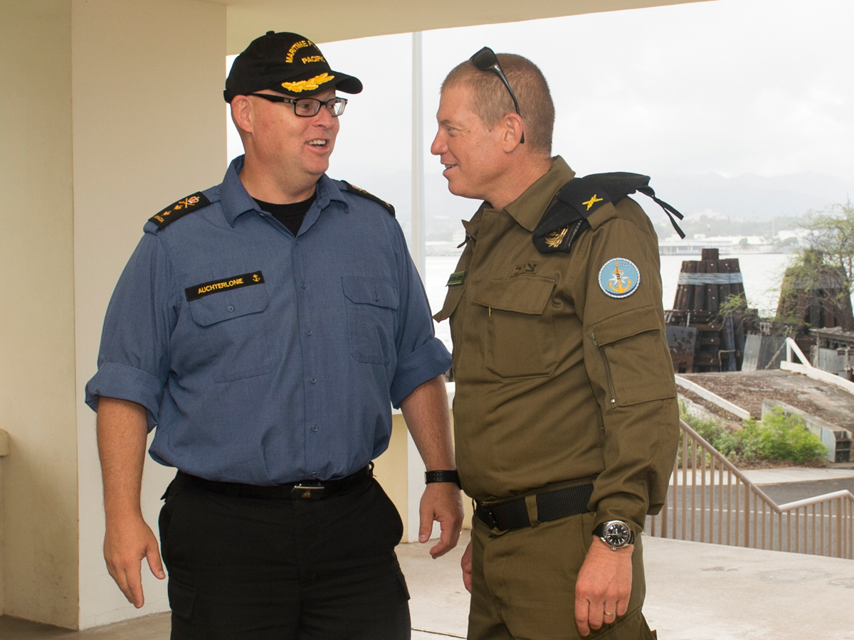 Rear Admiral Bob Auchterlonie, Deputy Commander Combined Task Force Royal Canadian Navy, and Rear Admiral Ido Ben-Moshe, Head of Operations of the Israeli Navy, meet at Joint Base Pearl Harbor-Hickam during the Rim of the Pacific (RIMPAC) exercise. Photo by U.S. Navy Mass Communication Specialist 3rd Class Jason Isaacs