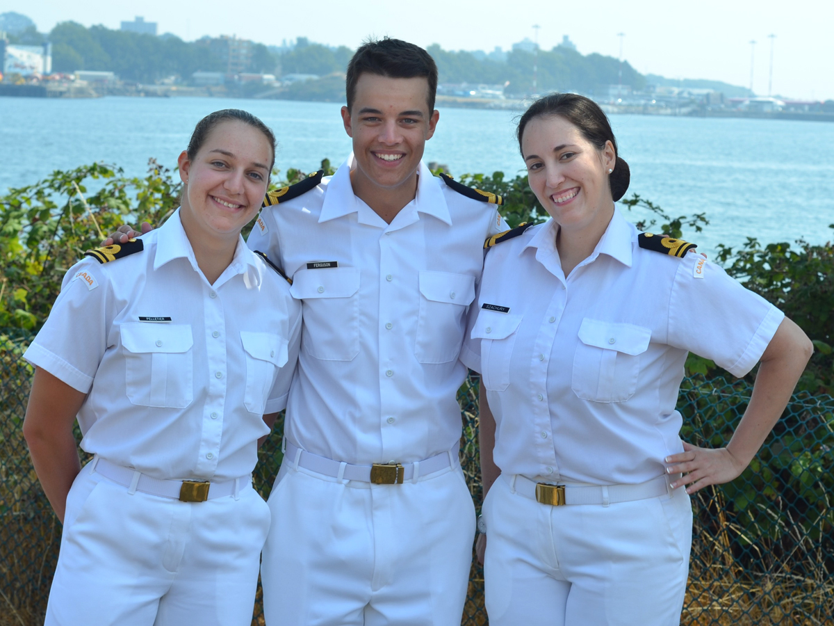 Left to right: SLt Pelletier, SLt Ferguson and SLt Szachury are all smiles after graduating their naval warfare officer course.