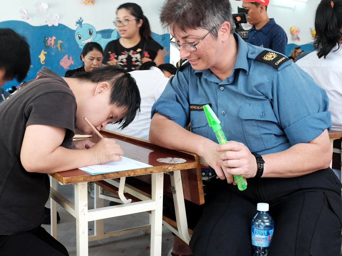 Crewmembers of HMCS Calgary entertained the children of a school and orphanage in Da Nang Vietnam while simultaneously helping to improve both sites with help from the Boomer’s Legacy Foundation.