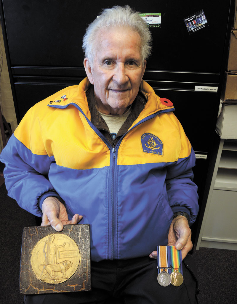 LS (Retired) Wayne Archibald displays the medals of his father Private Issac Archibald of Truro, N.S., who fought for Canada in France during the First World War. Photo by Peter Mallett, Lookout
