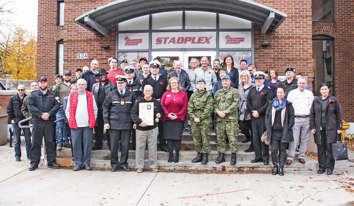 Members of the CFB Halifax and PSP community gathered outside Stadplex after Base Commander Capt(N) David Mazur locked the doors of the now-closed facility on Oct. 31.