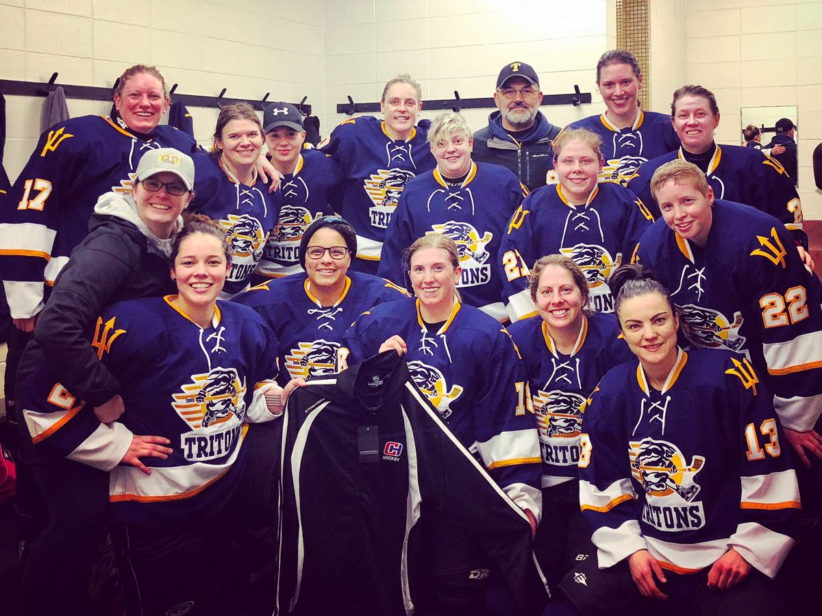 The Women’s Tritons hockey team are all smiles in their team’s dressing room after winning the CARHA Pacific Cup championship game at Oak Bay Arena on Jan. 20.