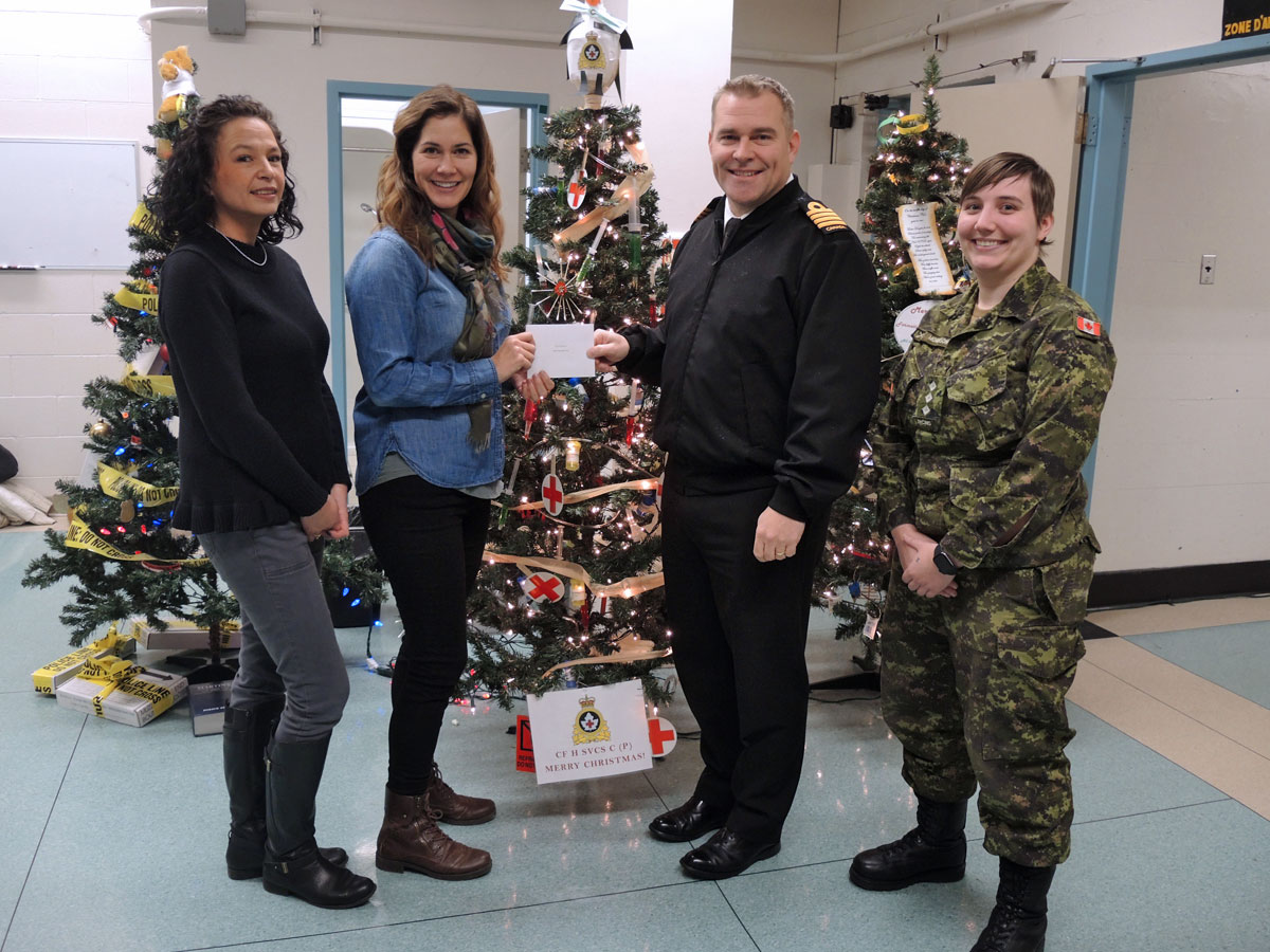 Best Griswold Tree, Canadian Forces Health Services Centre (Pacific): (Left) Terri Yuen, Sgt Shauna Karnes, Base Commander, Capt(N) Jason Boyd, and Capt Kelsie Morrison.
